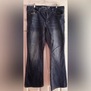 Seven7 brand bootcut jeans featuring a dark wash with fading Size 16